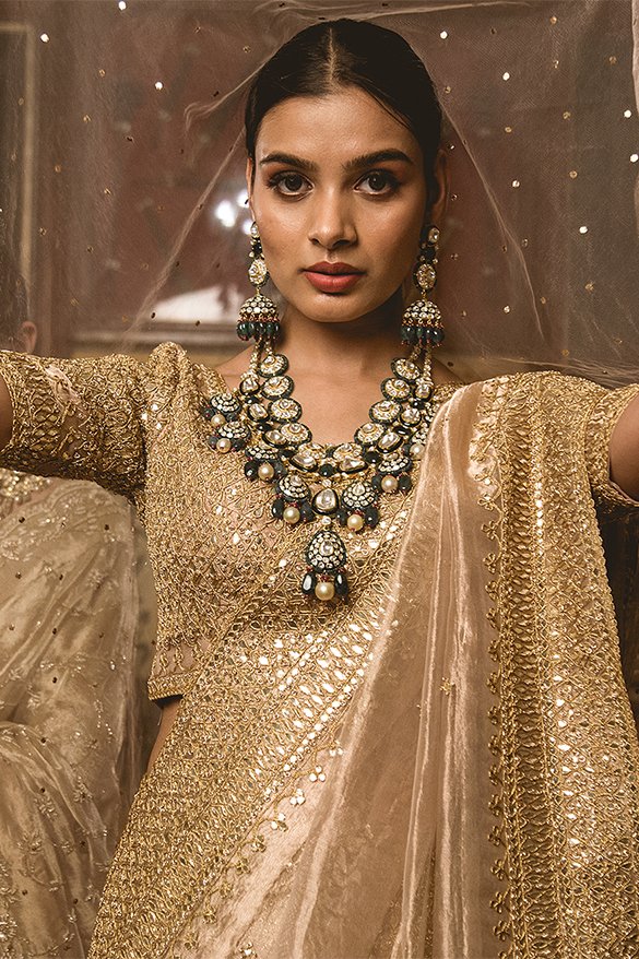 Golden Bride @lokhandeankita donning the beautiful golden lehenga at her  wedding 👰‍ Outfits - @manishmalhotra05 Jewellery @raniwa... | Instagram