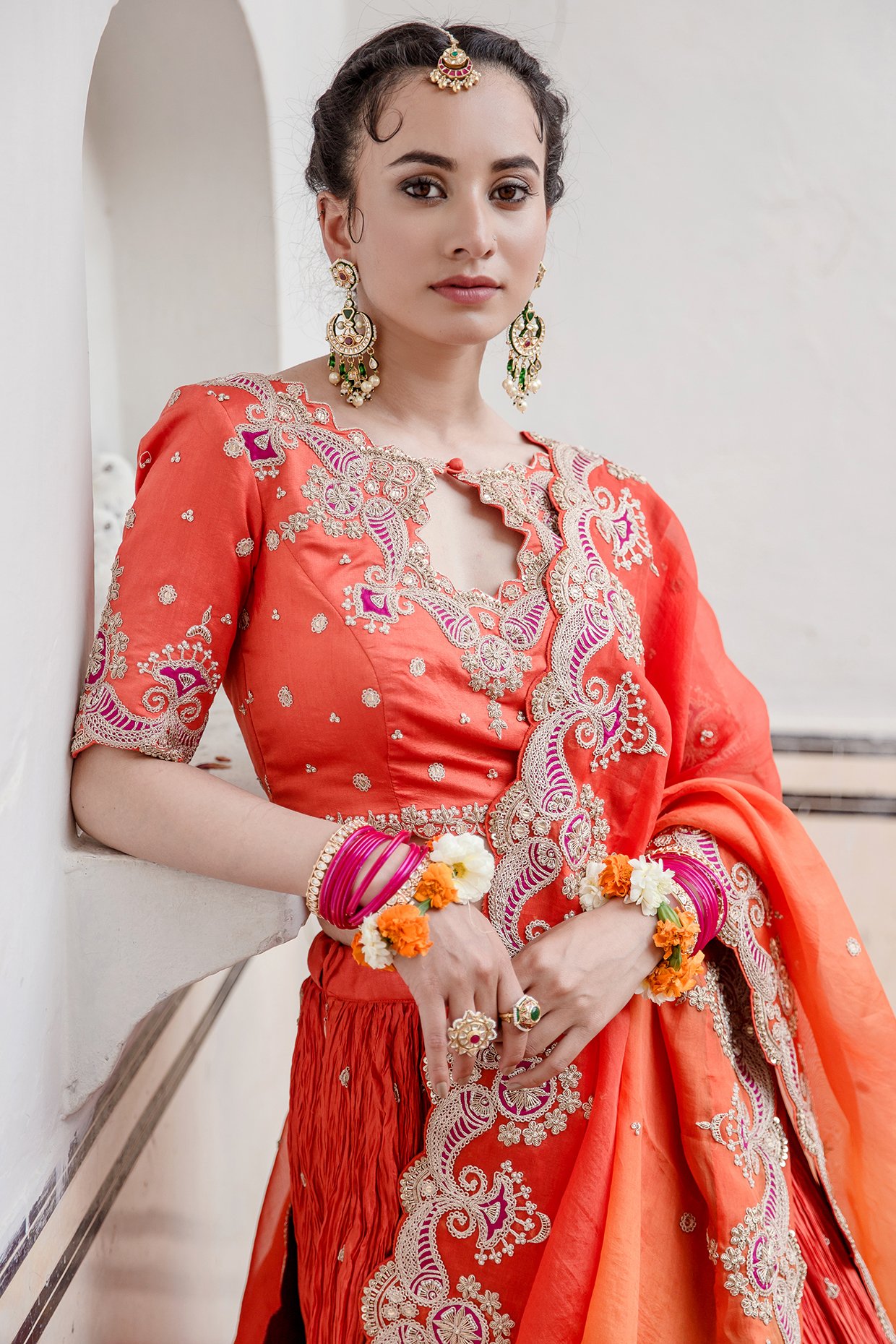 Saimika Trends - Bright Orange Lehenga with golden embroider this orange  lehenga looks glamourous because of the intricate golden embroidery with  red combination. Besides, beautifying it with the help of gold jewellery